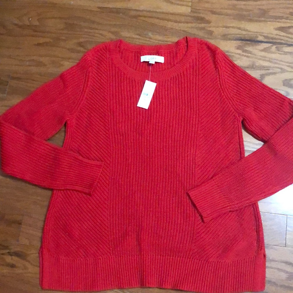 Red cable knit sweater